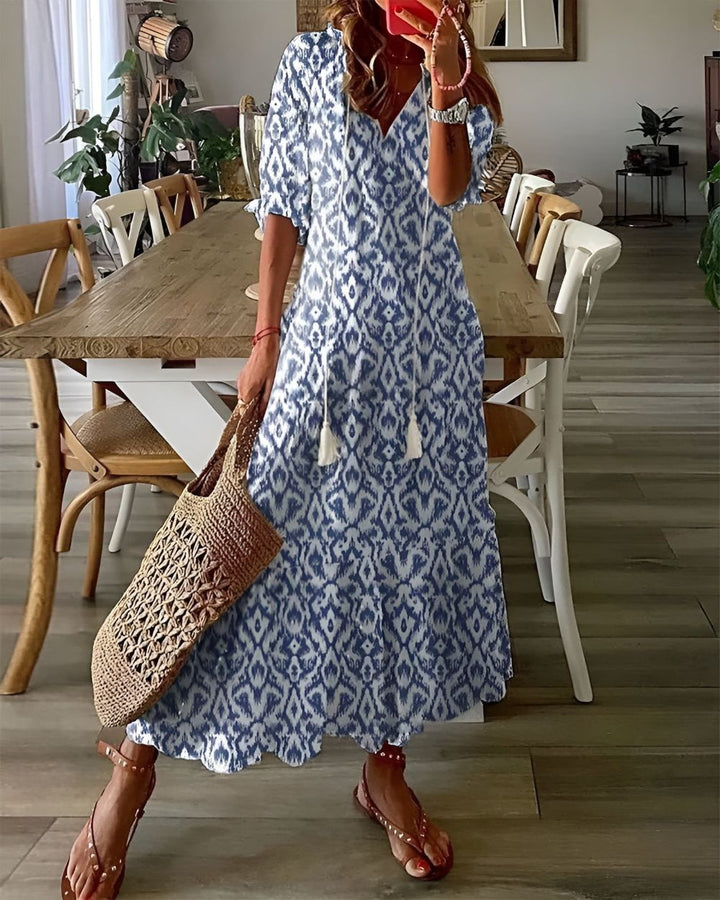 Elegant kvinders boho sommerkjole med afslappet pasform, perfekt til strand eller festival.