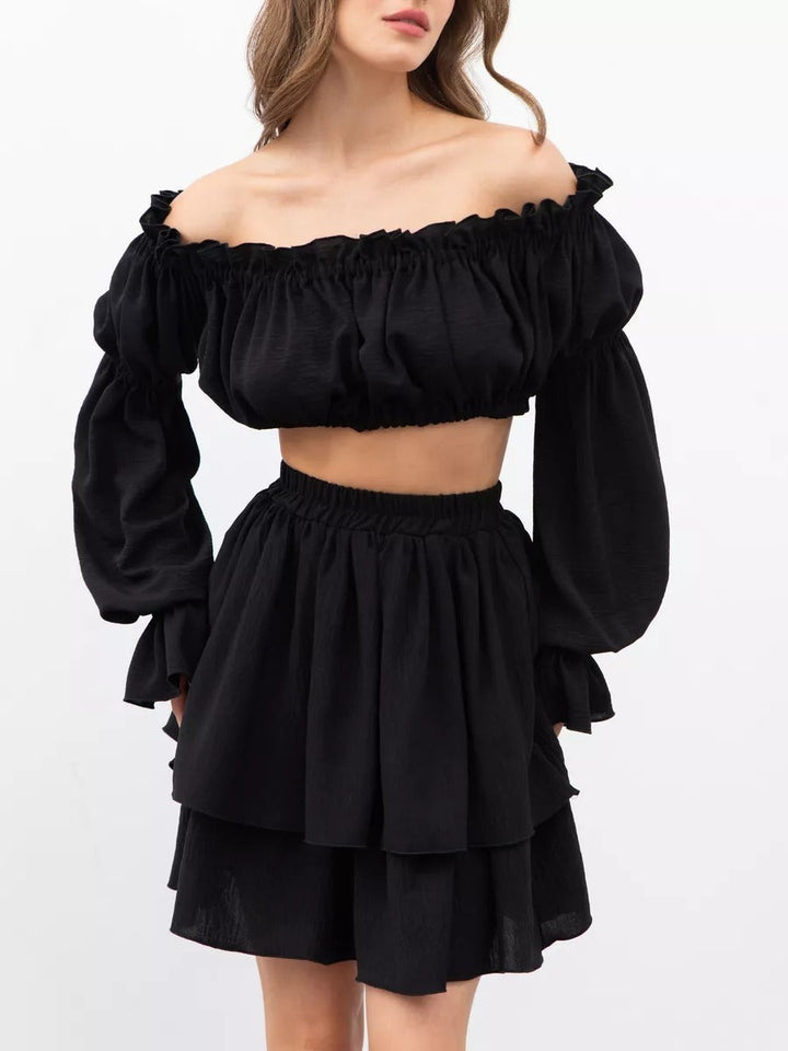 Elegant kvinders off-shoulder todelt sæt, perfekt til sommer og fest.