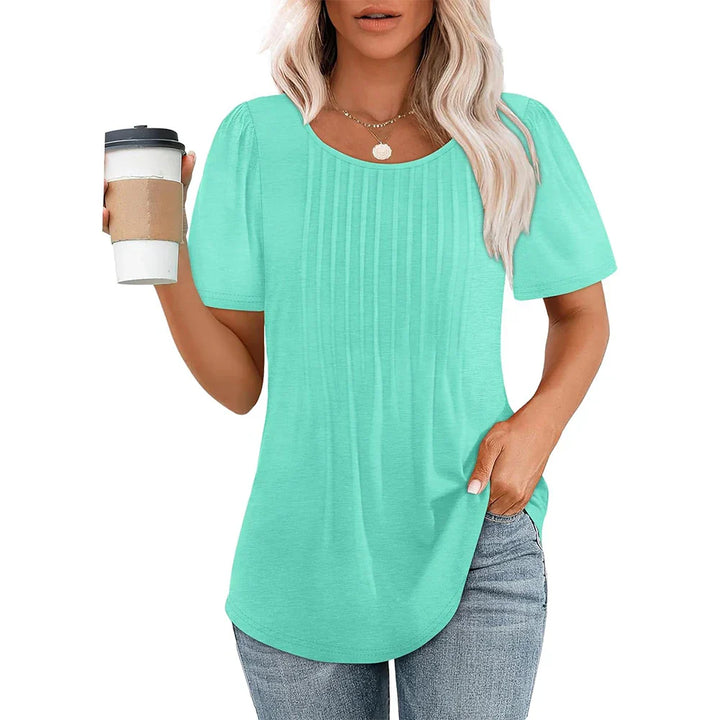 Elegant kvinders t-shirt i blødt, åndbart stof; sort farve; rund hals, korte ærmer; perfekt til hverdag og fest.