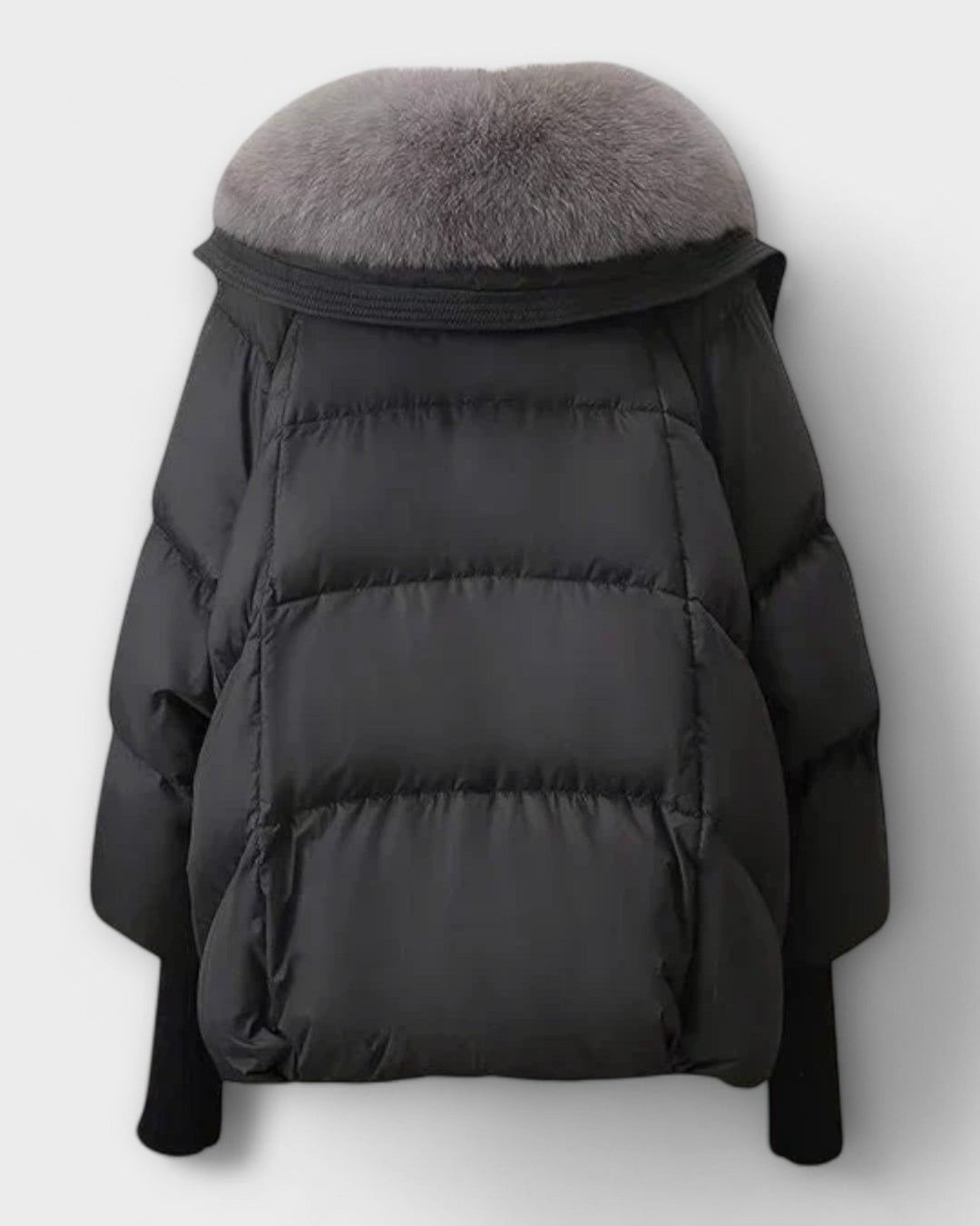 Varm og elegant damefrakke i høj kvalitet med luksuriøst pelsfor, ideel til et stilfuldt vinteroutfit.