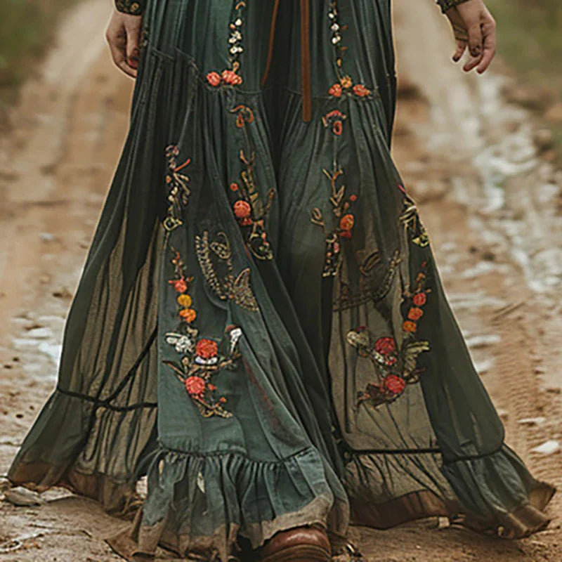 Boho-stil langærmet maxikjole til kvinder med elegant blomsterprint. Perfekt som hverdagskjole eller festkjole.