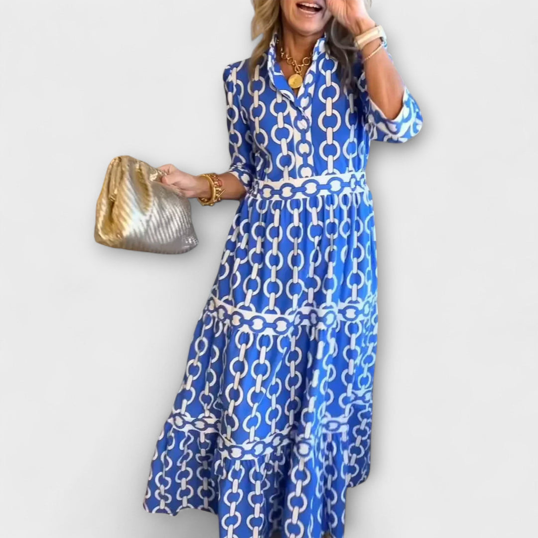 Elegant midi kjole til kvinder med stilfuldt kædemønster, perfekt til sommer og festlige lejligheder.