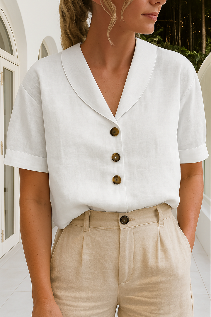 Elegant omslagsbluse til kvinder i klassisk stil. Komfortabel og alsidig til både arbejde og fritid.