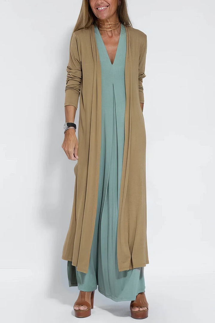 Elegant plus size lang kjole med ærmeløst snit og flatterende V-hals til damer.