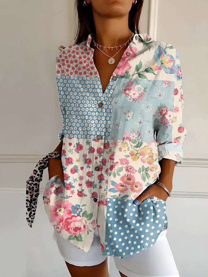 Komfortabel og elegant bluse til kvinder med smukt blomsterprint. Ideel til modebevidste.