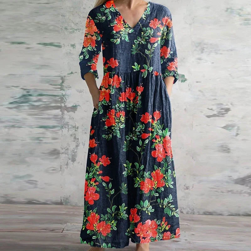 Kvinders retro maxi kjole, elegant design med sommerligt blomstermønster for et sofistikeret look.