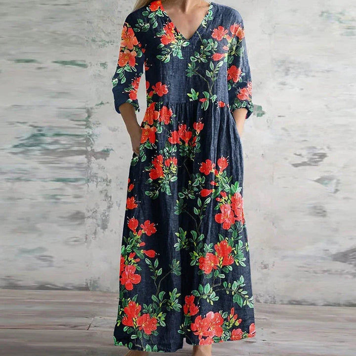 Kvinders retro maxi kjole, elegant design med sommerligt blomstermønster for et sofistikeret look.
