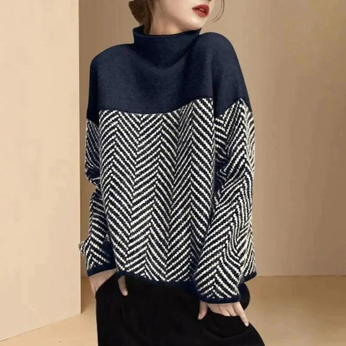 Stilfuld dametrøje i elegant design. Langærmet rullekravetrøje til efterår/vinter.