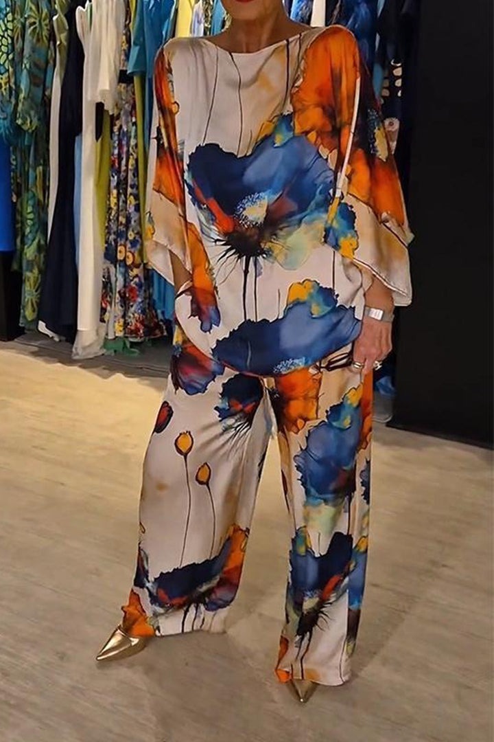 Elegant satinsæt til kvinder med løs pasform. Stilfuldt, komfortabelt og alsidigt outfit.