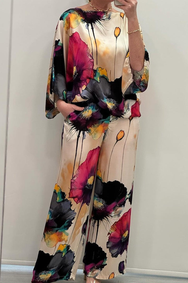 Løst siddende satinsæt til kvinder, elegant og komfortabelt til både hverdag og fest.