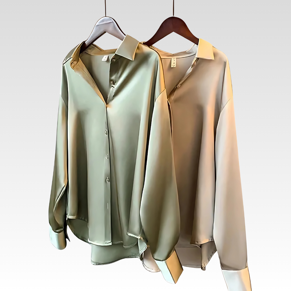 Kvinders satinbluse med silkeagtig finish, klassisk og komfortabel. Ideel til arbejdstøj og modebevidste kvinder.
