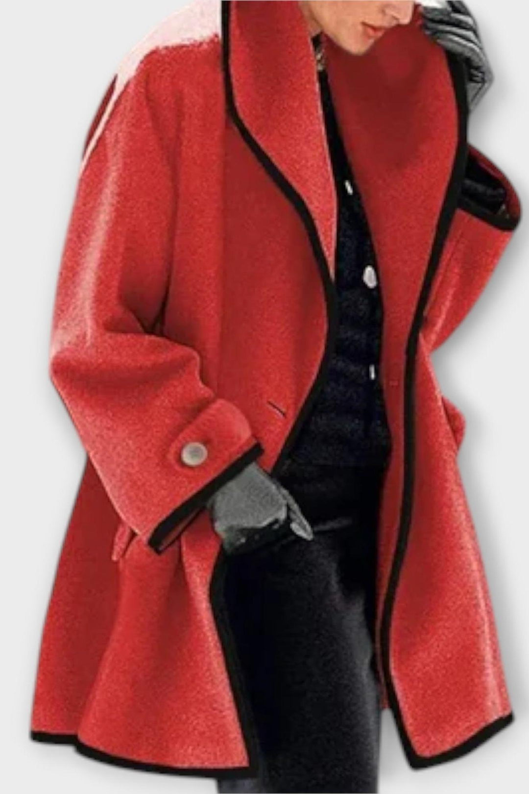 Klassisk damefrakke set bagfra, fremhæver den skræddersyede linje og tidløse elegance i designet.