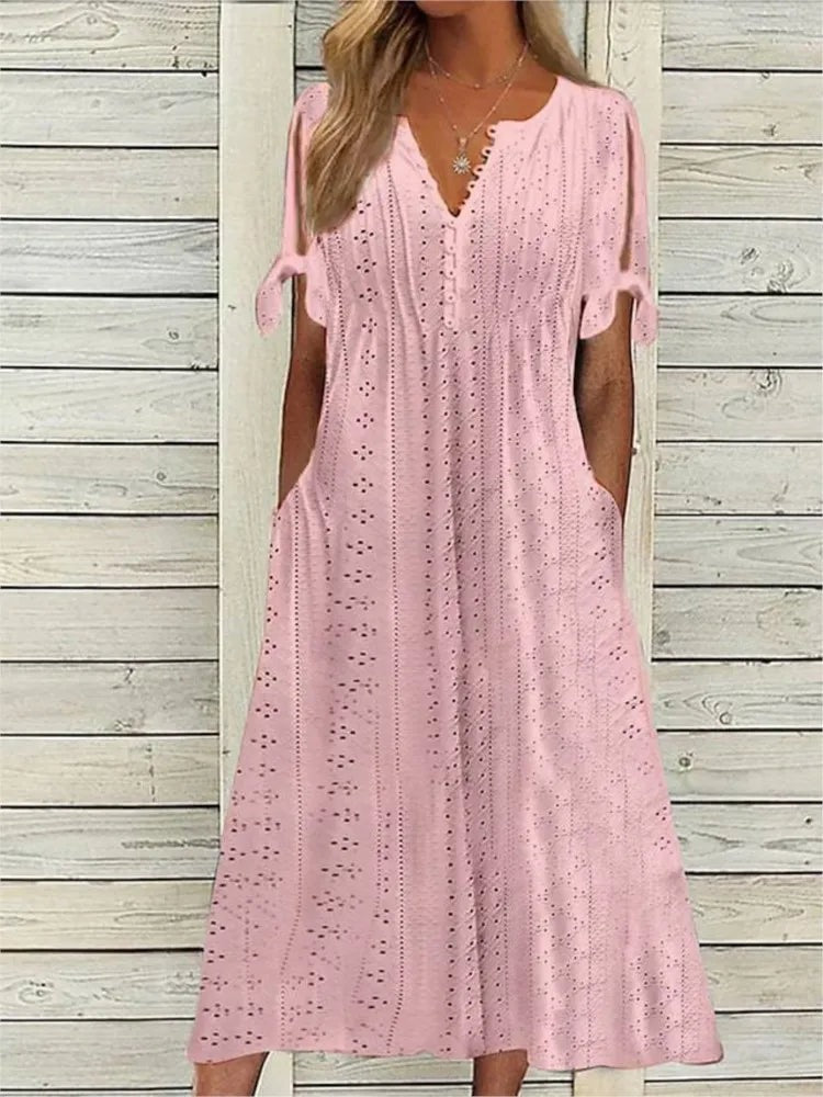 Elegant og komfortabel sommerkjole for kvinder, stilfuld til enhver anledning. En festkjole.