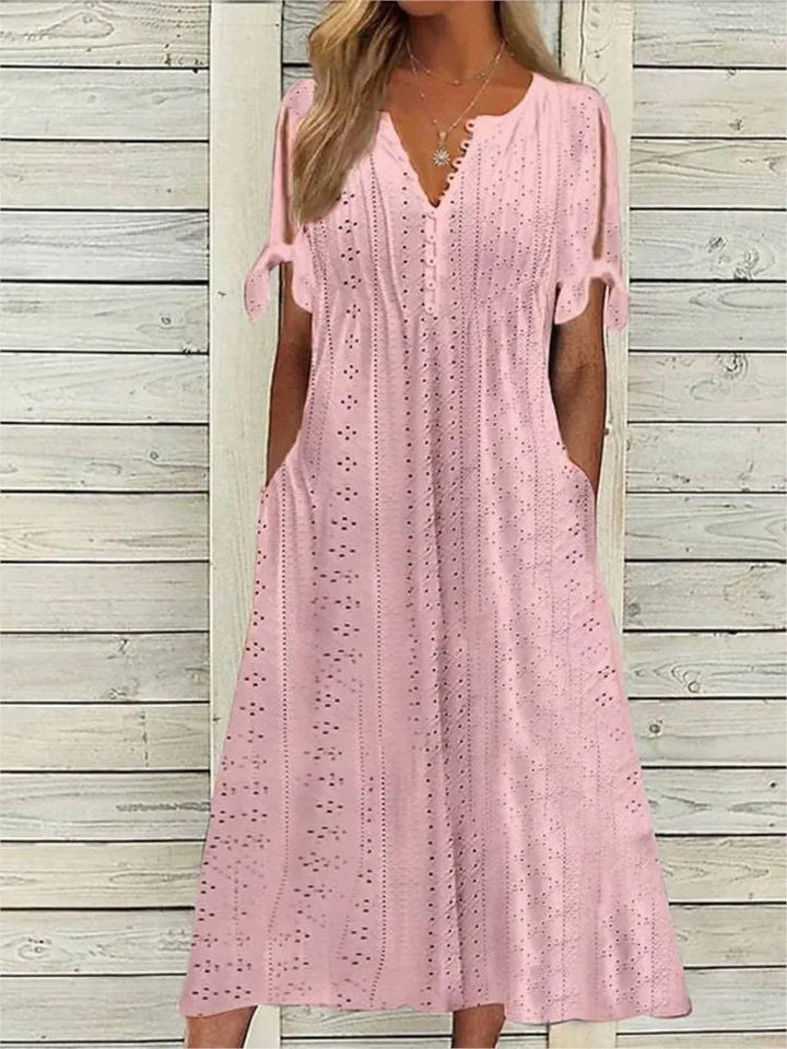 Elegant og komfortabel sommerkjole for kvinder, stilfuld til enhver anledning. En festkjole.