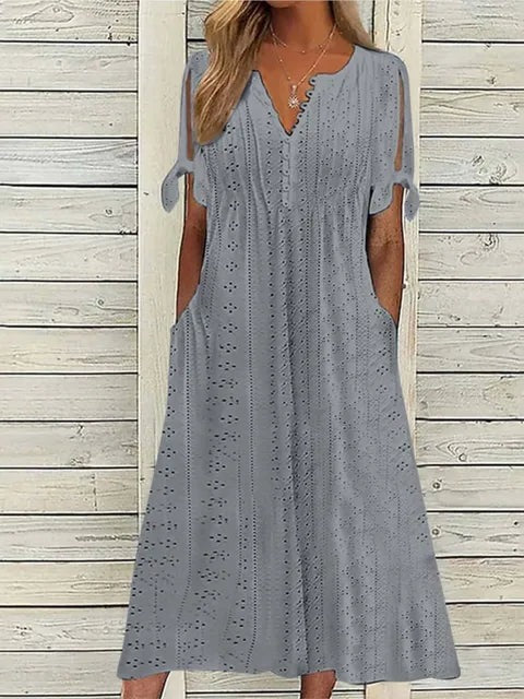 Stilfuld kvindekjole, komfortabel sommerkjole. Elegant design for fest og hverdag i mode.