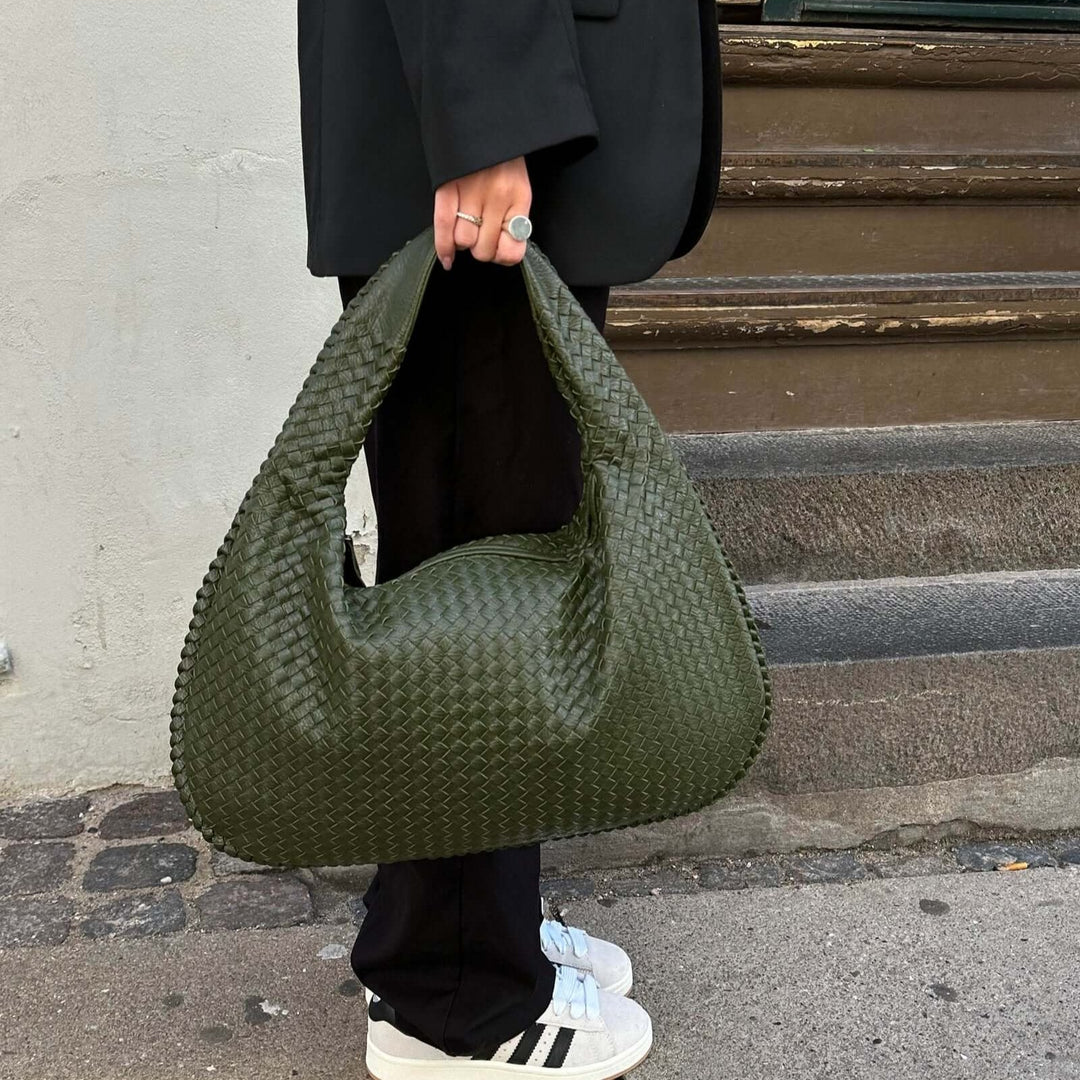 Elegant håndtaske til kvinder; en stilfuld og praktisk dametaske, ideel til daglig mode og brug.