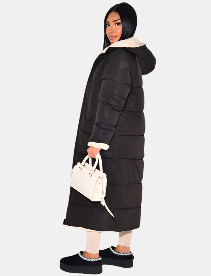 Elegant sort lang dame vinterfrakke, ultimativ varme og tidløs stil til kvinder.