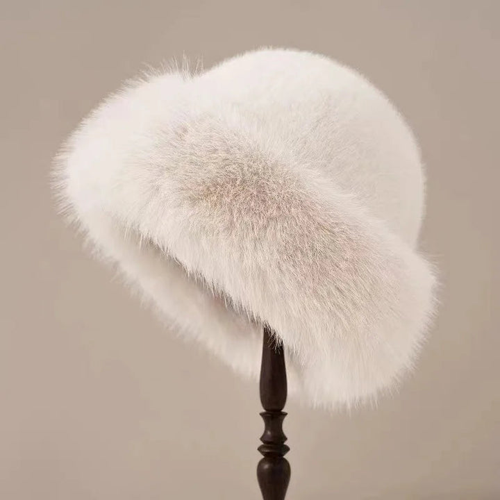 Varm og elegant dame vinterhue, perfekt til at holde hovedet varmt og tilføje et stilfuldt touch til outfittet.