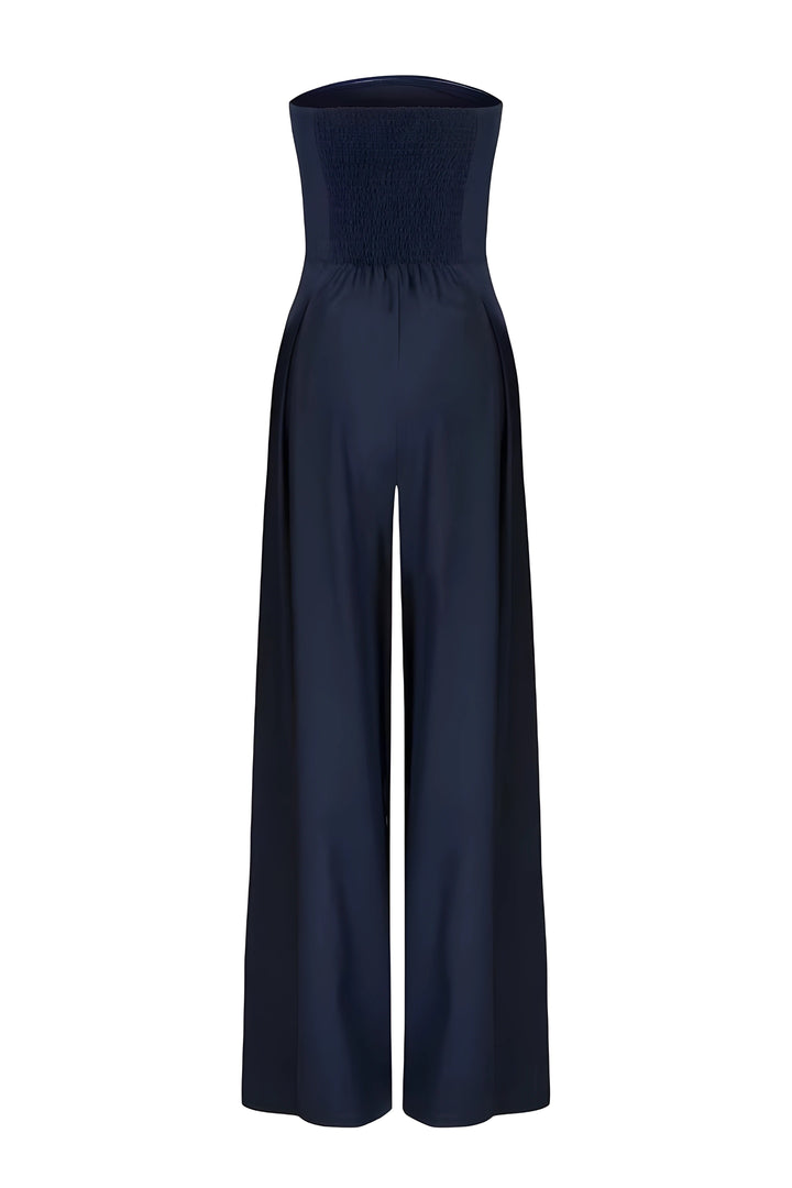 Sofistikeret stropløs jumpsuit for kvinder. Elegant festtøj i moderne design.