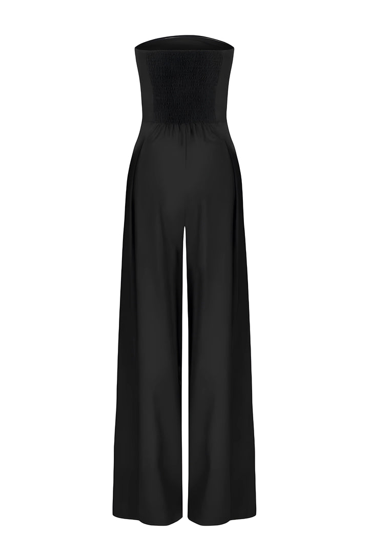 Stilfuld stropløs jumpsuit til kvinder. Essentiel del af din festtøj- og aftentøjskollektion.