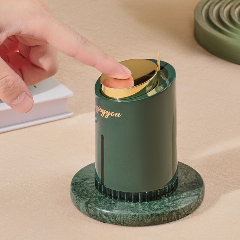 Moderne tandstikholder for hjemmet. Elegant design, praktisk trykfunktion. Et smart hjemmetilbehør til spisestuen.