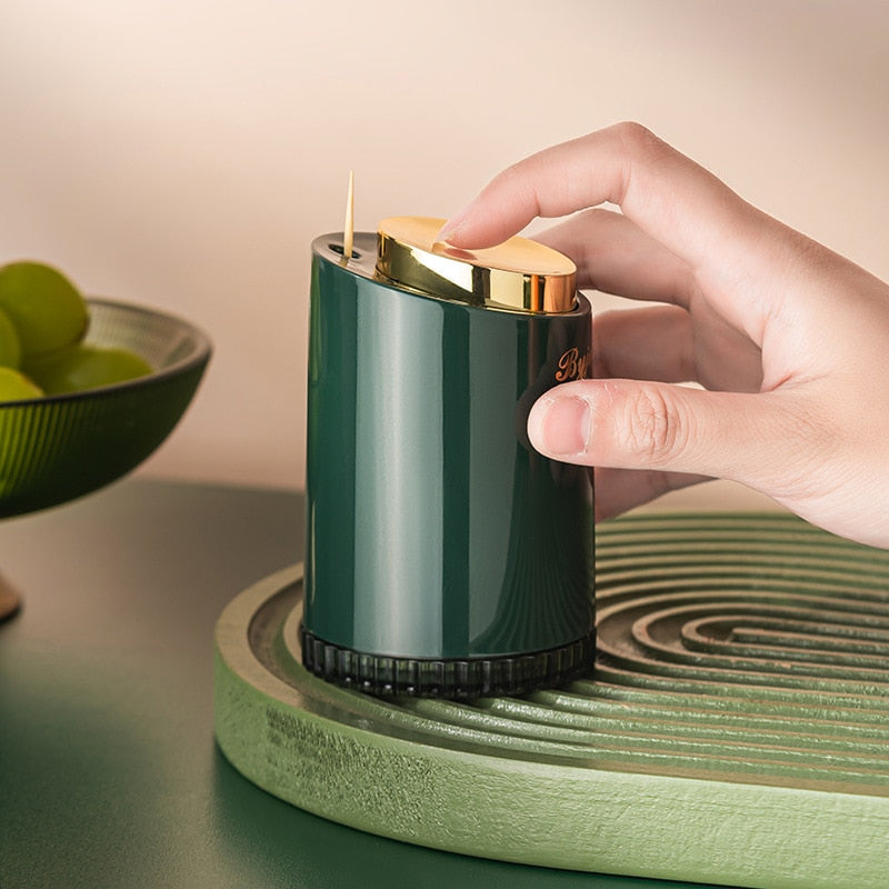 Hygiejnisk tandstikholder med trykfunktion. Smart dispenser sikrer nem adgang til tandstikker ved borddækning.