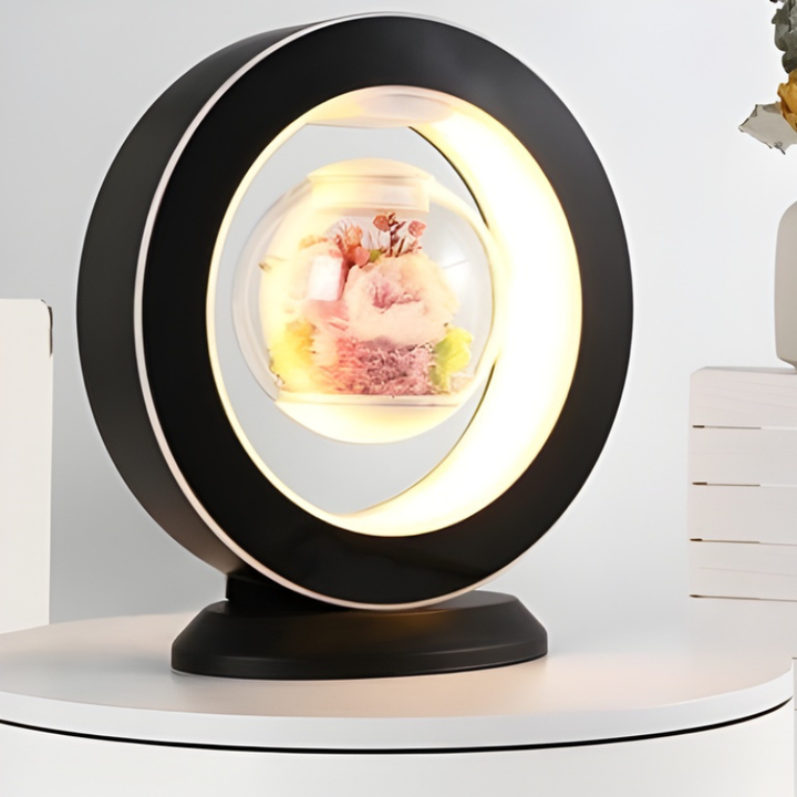 Elegant USB bordlampe med flydende blomst. Perfekt som gaveide eller dekorativ belysning i moderne hjem.