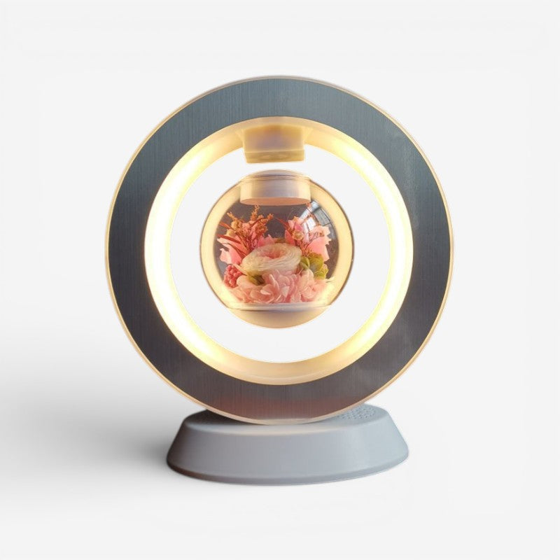 Moderne bordlampe med fascinerende flydende blomst. Ideel som skrivebordslampe eller stemningsbelysning.