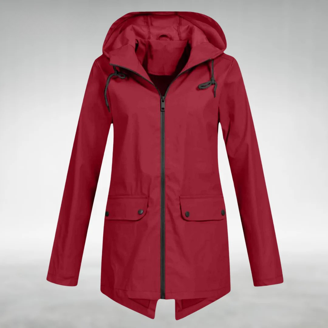 Elegant vindtæt softshell damejakke med hætte. Ideel overgangsjakke til forår og efterår.