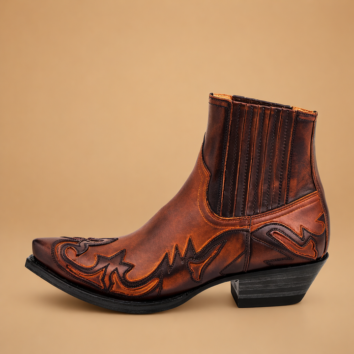 Elegante herrestøvler i moderne western stil, perfekt til stilfuld herremode.