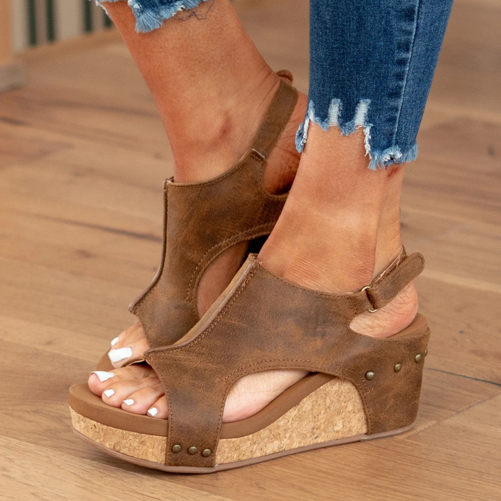 Elegante og komfortable kile-sandaler til sommeren, en essentiel damessko for et chic og afslappet look.