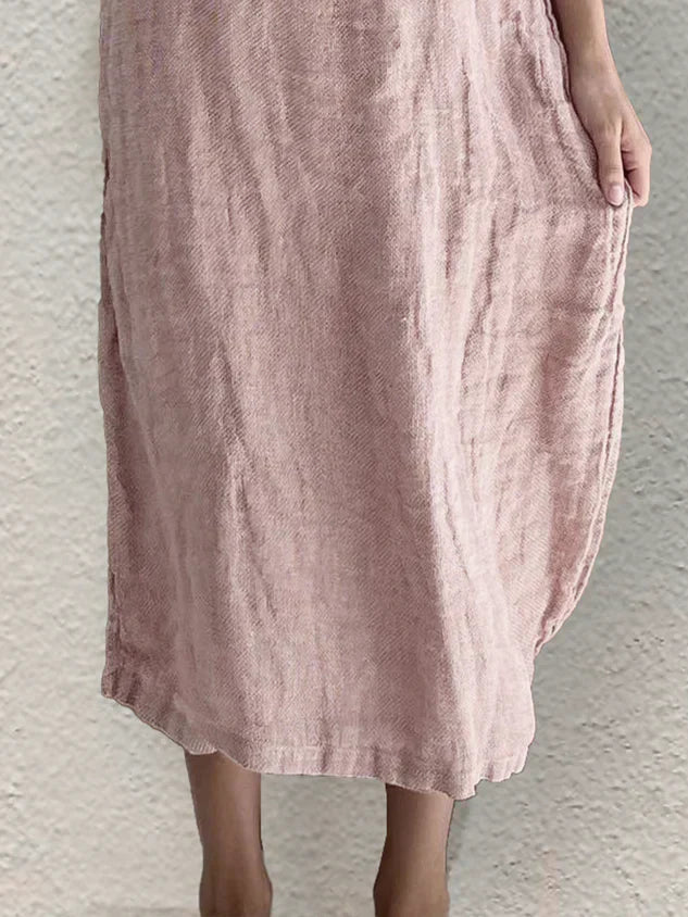 "Elegante Stilla sommerkjole i bomuld-linned, løstsiddende pasform, rund hals, ærmeløs til afslapning og stil."