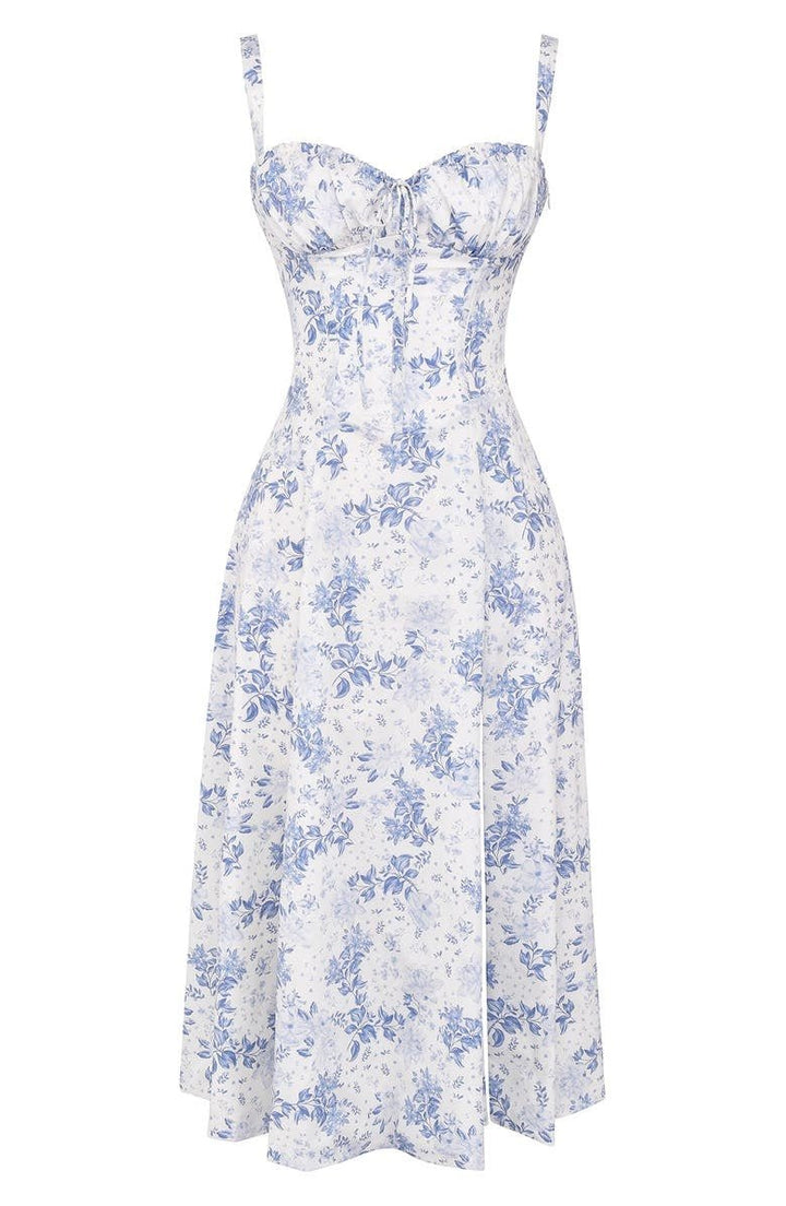Elegante talje-kjole i champagnefarve med bustier-design og forførende sideslids, ideel til sommerens fester.