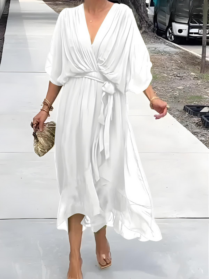 Smuk damekjole i lang model, en elegant sommerkjole til sol og strand.