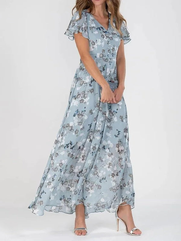 Elegant og let forårs-/sommerkjole i farverigt design til kvinder. En stilfuld og komfortabel modekjole.