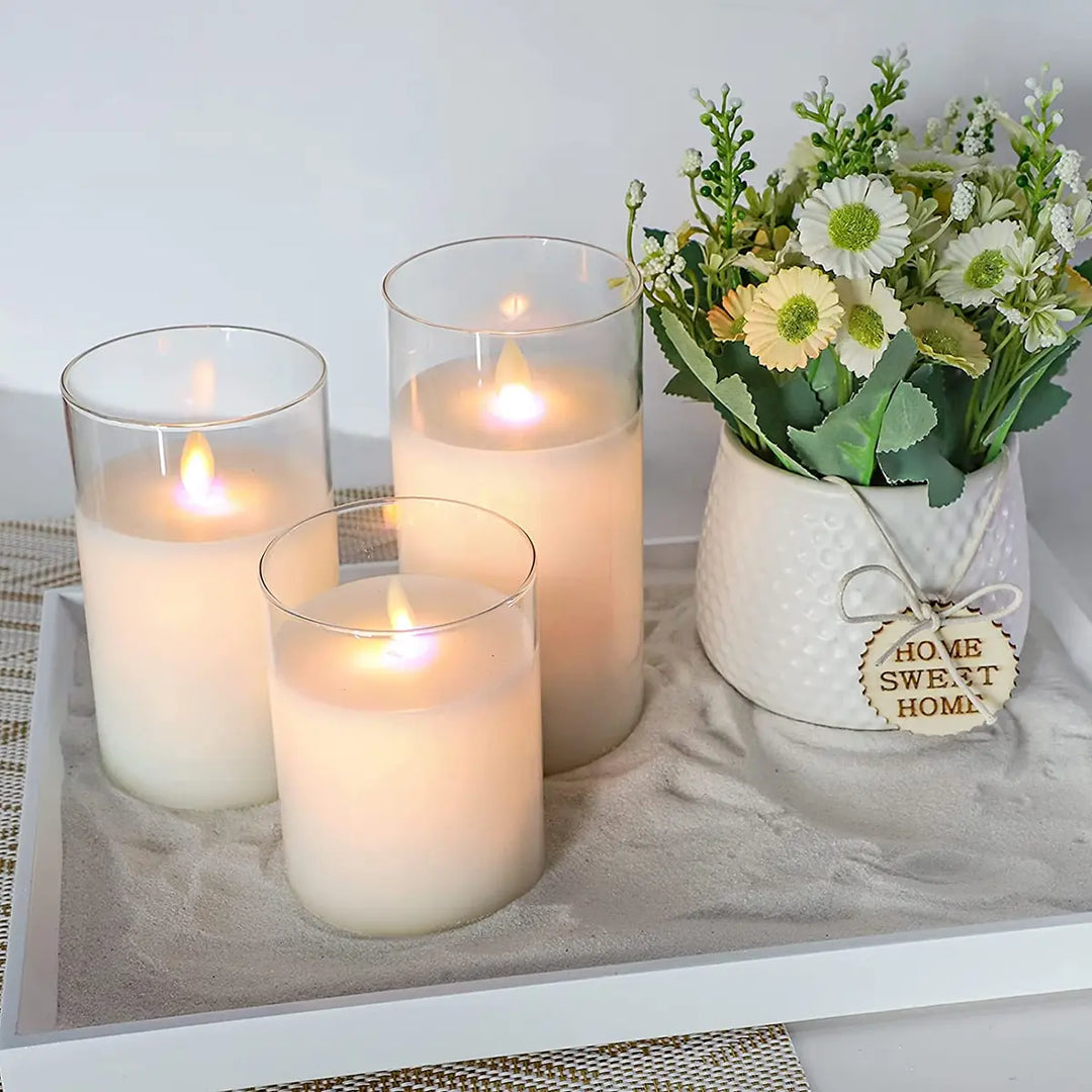 Elegante flammefrie LED-akryllys med varmt, flimrende skær til stemningsfuld indendørs hygge.
