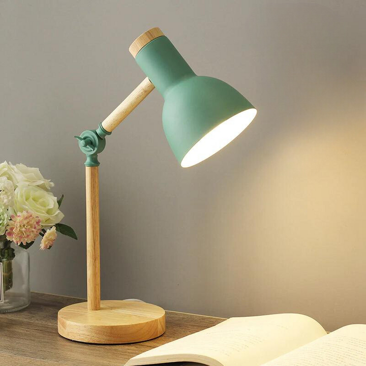 Foldbar LED bordlampe med blødt, indirekte lys, ideel til moderne hjemmeindretning og hyggelig stemning.