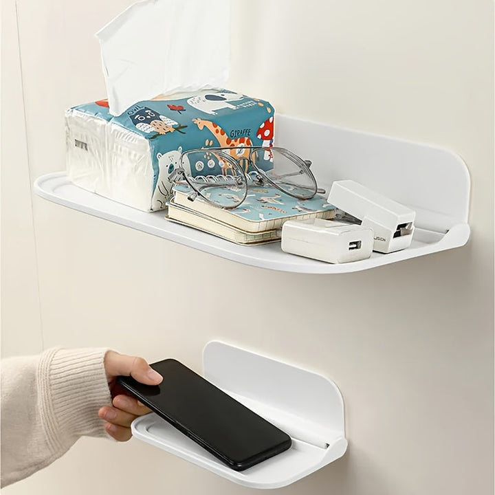 Foldbar væghylde i minimalistisk design, ingen boring nødvendig, perfekt til badeværelse og køkken, pladsbesparende.