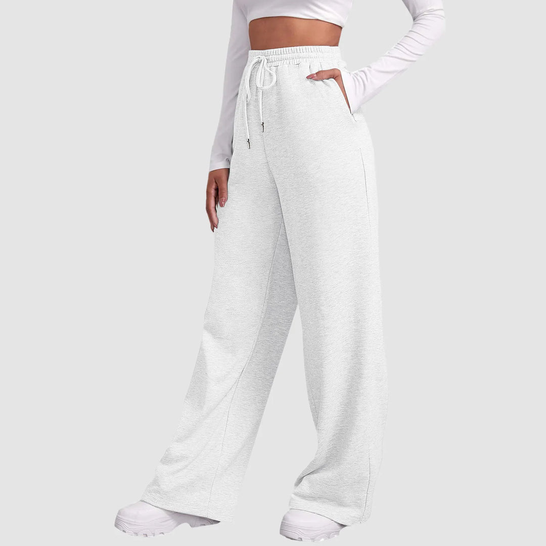 Komfortable dame sweatpants med brede ben og høj talje i sølvfarve. Perfekte afslappede bukser til trendy stil.