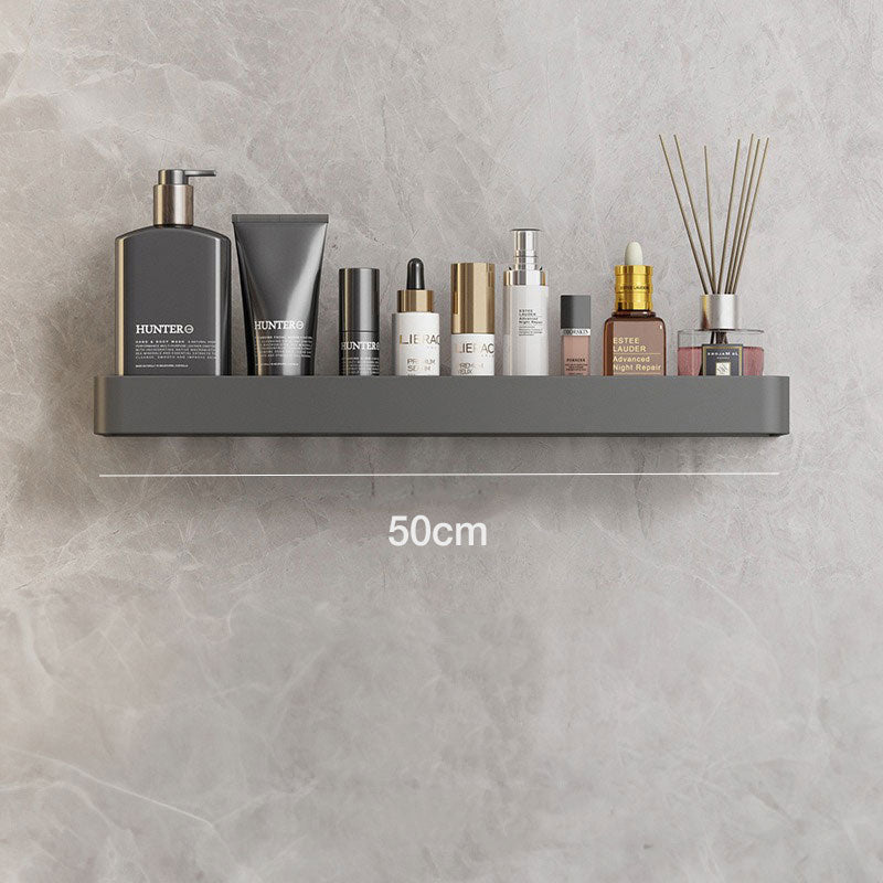 Grå håndklædehylde til væg, selvklæbende og moderne design for et ryddeligt badeværelse.