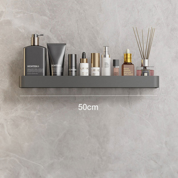 Grå håndklædehylde til væg, selvklæbende og moderne design for et ryddeligt badeværelse.