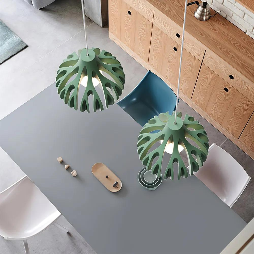 Stilfuld, grøn LED-loftslampe med dæmpbar funktion. Geometrisk form for moderne indendørs belysning.