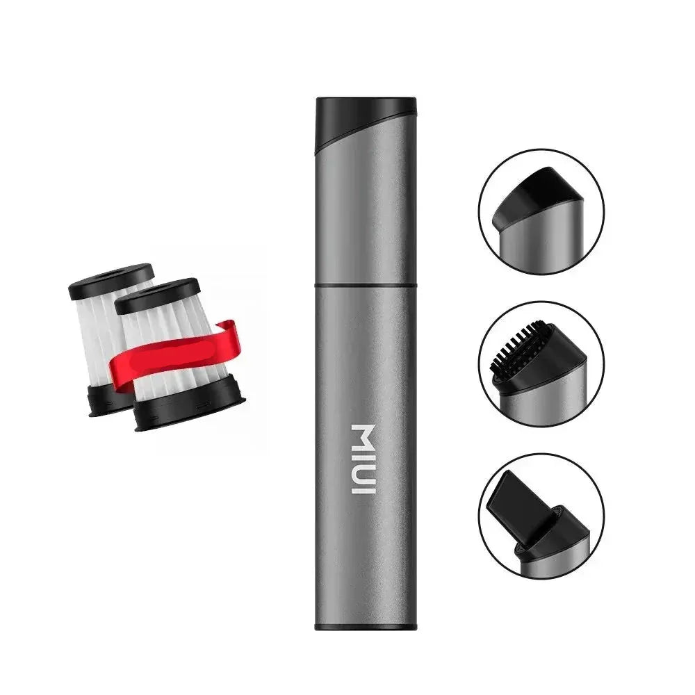 Grøn/grå kompakt USB trådløs ministøvsuger til præcis rengøring af små områder.