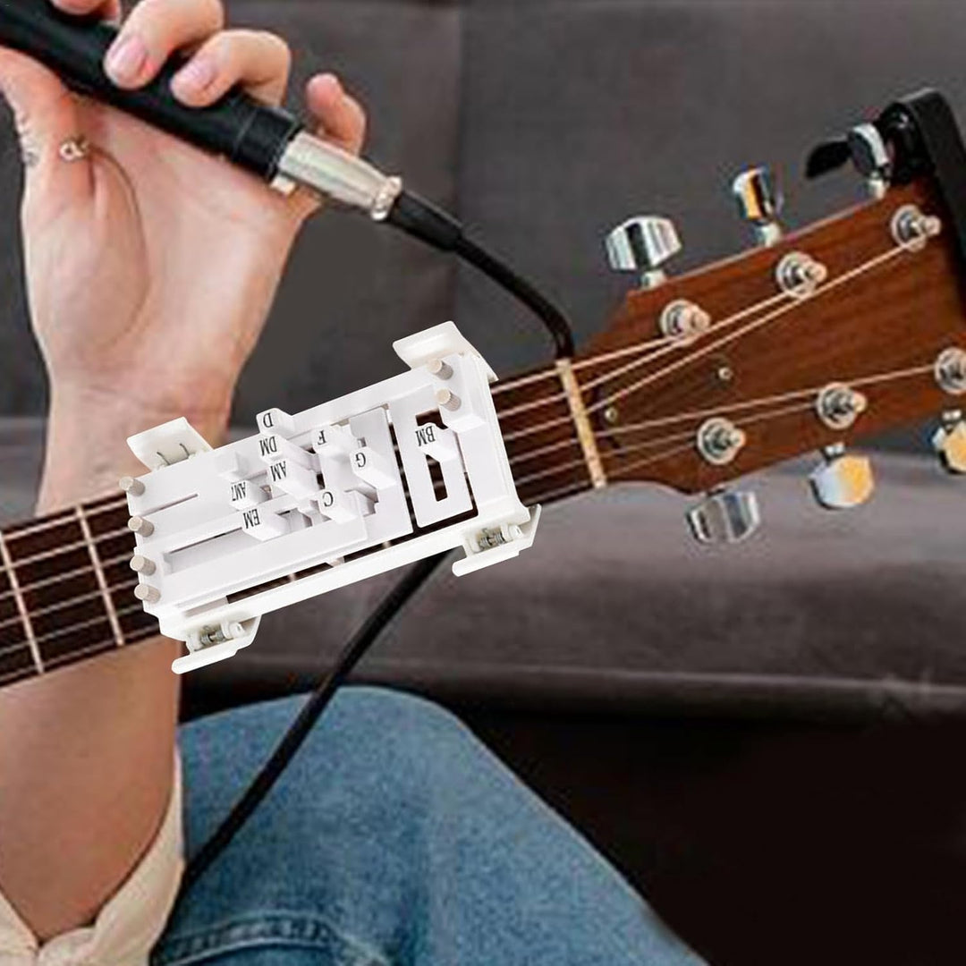 Guitartræner for begyndere. Lær at spille guitar hurtigt og smertefrit med effektiv akkordhjælp.
