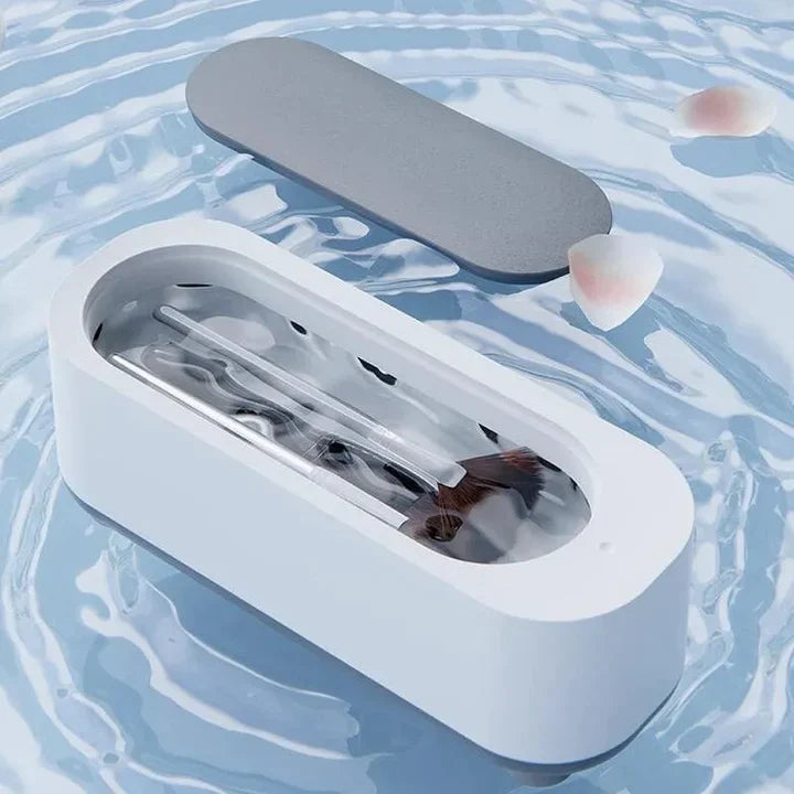 Kompakt ultralydsrenser designet til skånsom, men grundig rensning af smykker og ure. Giver hygiejnisk glans.