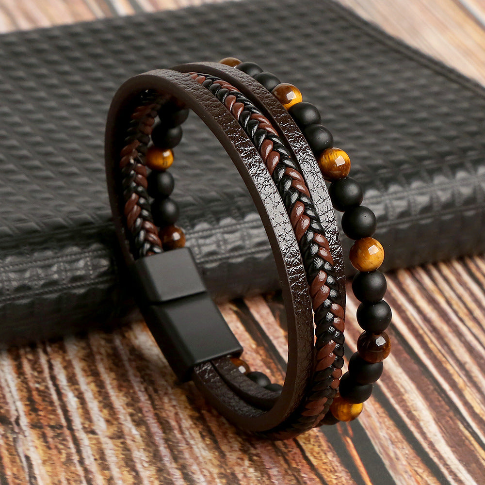 Herre armbåndsæt i flet: elegant, moderne design i sort, brun og blå. Stilfuldt tilbehør til hverdagsbrug.
