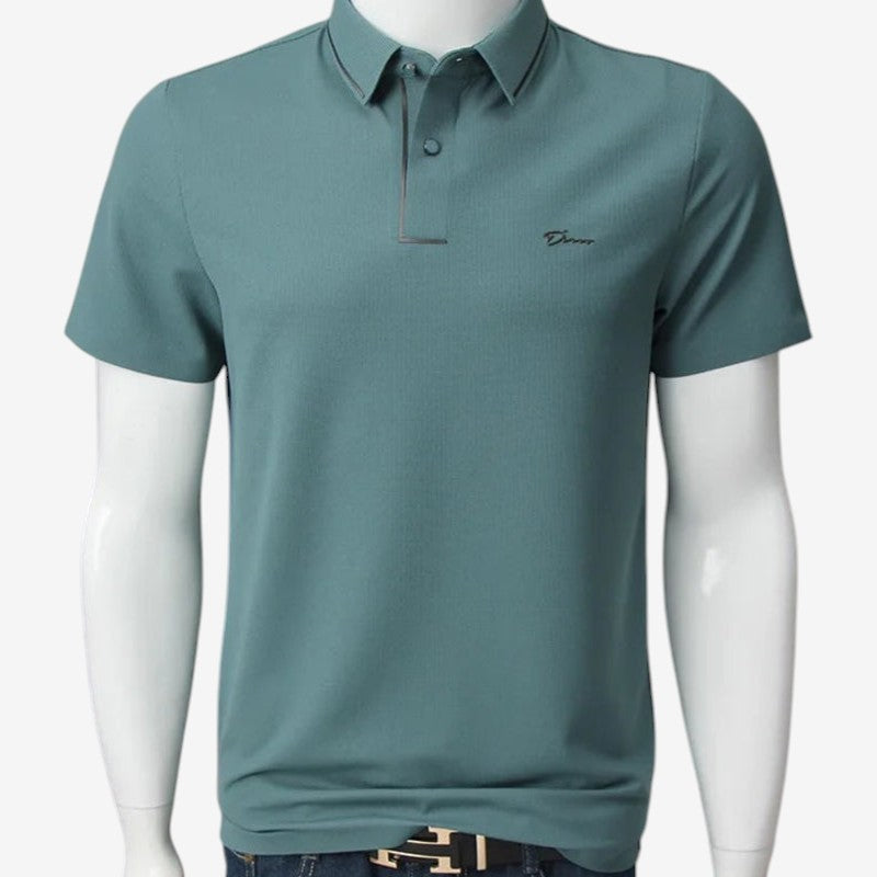 Herre kortærmet polo med stilfuldt print og knapkrave. Komfortabelt og casual look.