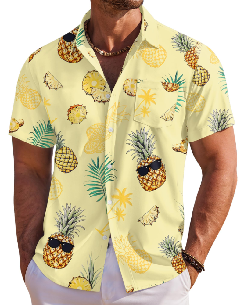Sommerlig herre skjorte med palmeblade og blomster. En klassiker til din feriegarderobe.