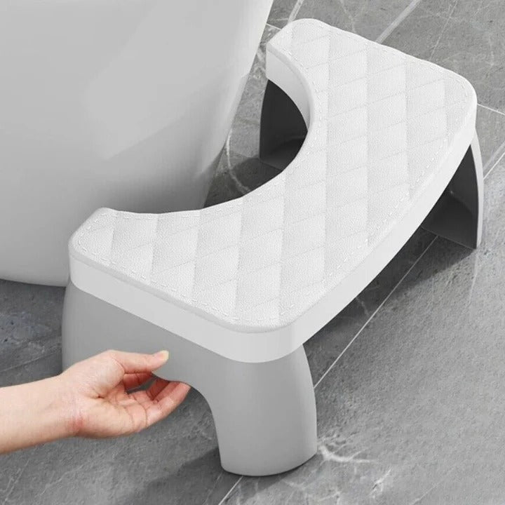 Ergonomisk badeværelseskammel i moderne design. Fremmer sundhed og en naturlig kropsholdning effektivt.