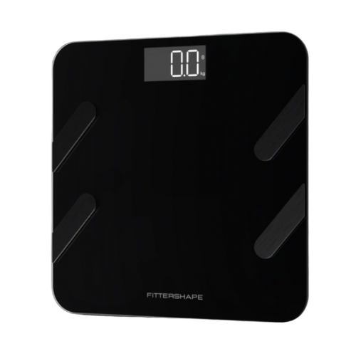 Sort ScaleOn smartvægt på badeværelsesgulv, klar til at spore dine fitnessfremskridt.